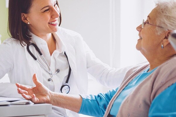 Doctor and patient talking