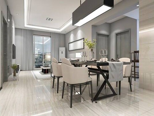 Well lit living area along with a dining space