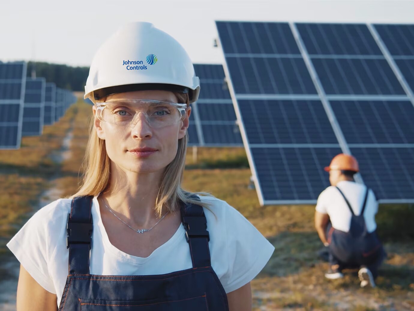 Female employee infront of solar panel