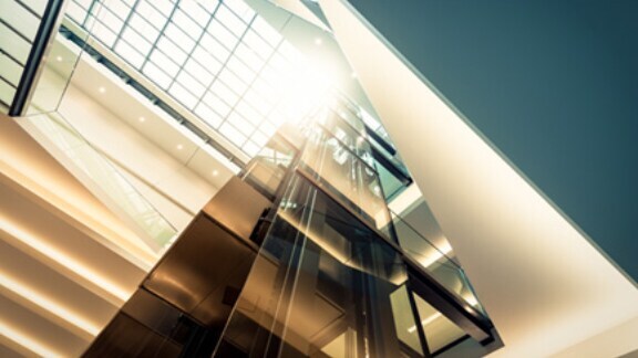 sunlight-peeking-through-windows-glass-building