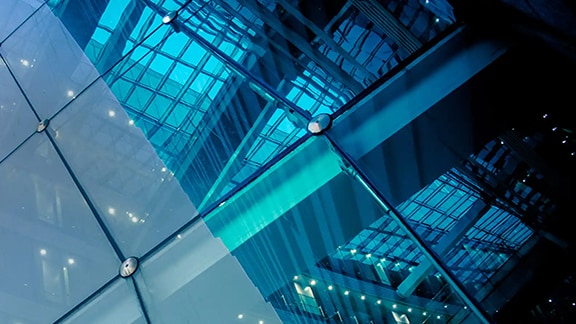 Low-angle view of a skyscraper with glass exteriors